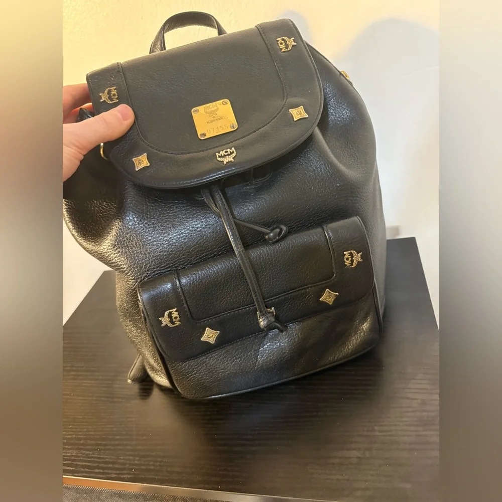 MCM‎ Black Leather Backpack with Gold Accents and draw strings 12